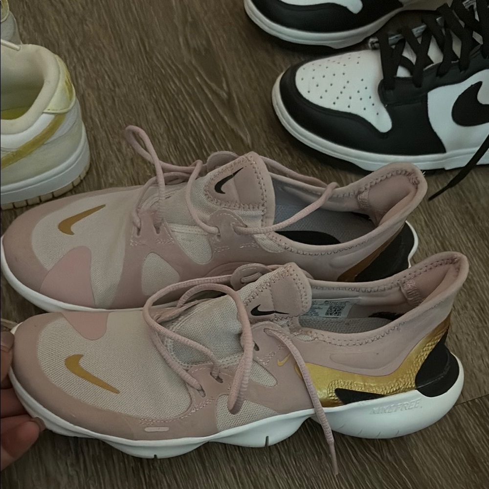 Authentic women Nike Pink and Gold Sneakers size 7.5